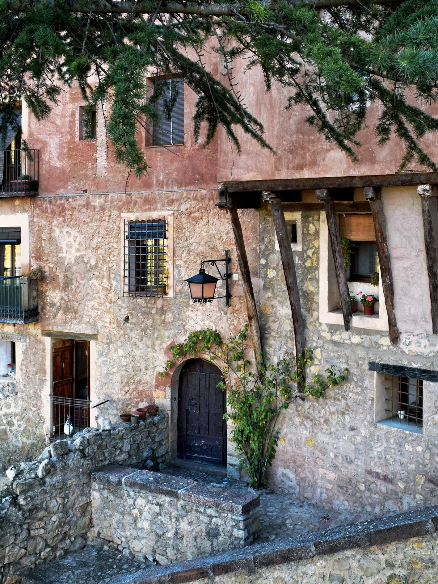Charming old town stone buildings in Albarracín, Spain, showcasing ancient architecture and rustic charm.